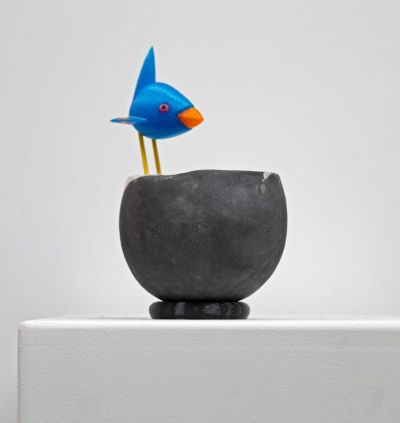 raku bird's nest, with blue bird by Chris Barnes