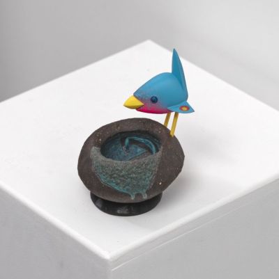 blue bird on black nest with roundels by Chris Barnes
